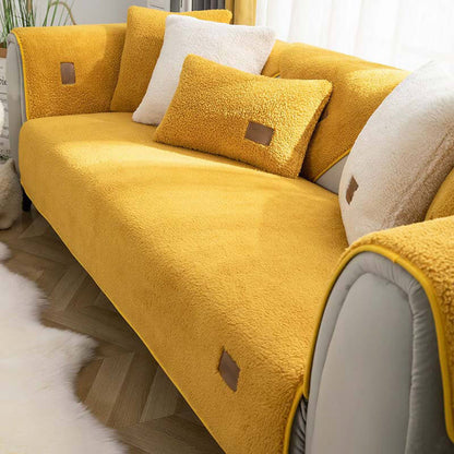 Yellow sherpa-style sofa cover fitted to a sofa