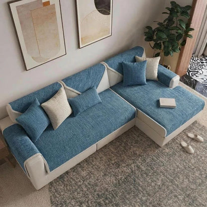 Blue anti-scratch chenille sofa cover on an L-shaped sofa