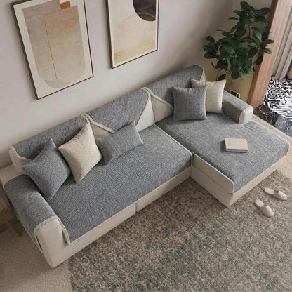 Grey anti-scratch chenille sofa cover on an L-shaped sofa