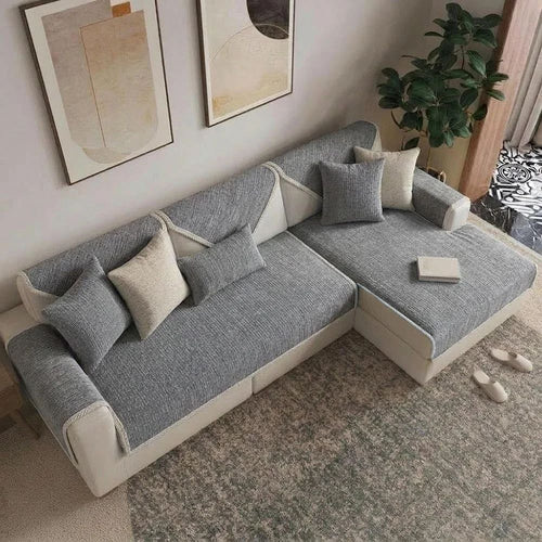 Grey anti-scratch chenille sofa cover on an L-shaped sofa