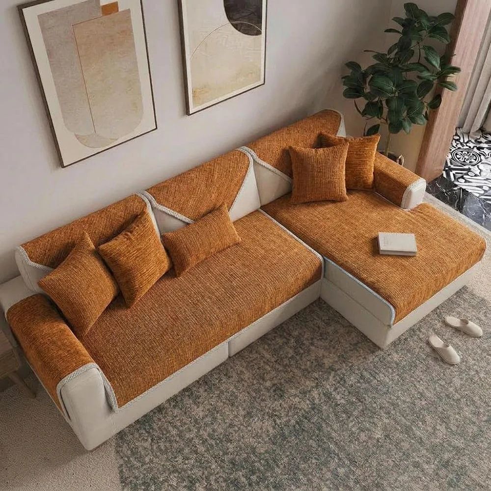 Orange anti-scratch chenille sofa cover on an L-shaped sofa