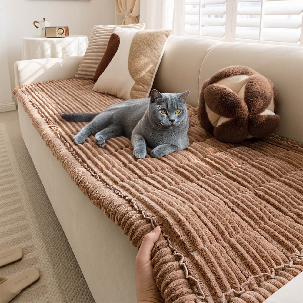 Flannel couch cover protecting upholstery from pets