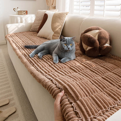 Flannel couch cover protecting upholstery from pets